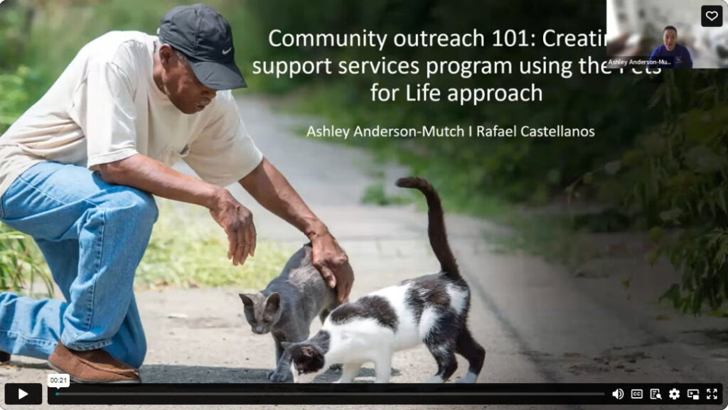 Title slide of Community Outreach 101 presentation showing an African-American man kneeling and petting a gray cat
